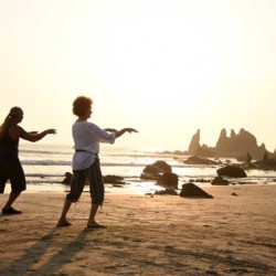 Sunset on the beach in front of Guesthouse Luciano. Practicing Tai Chi